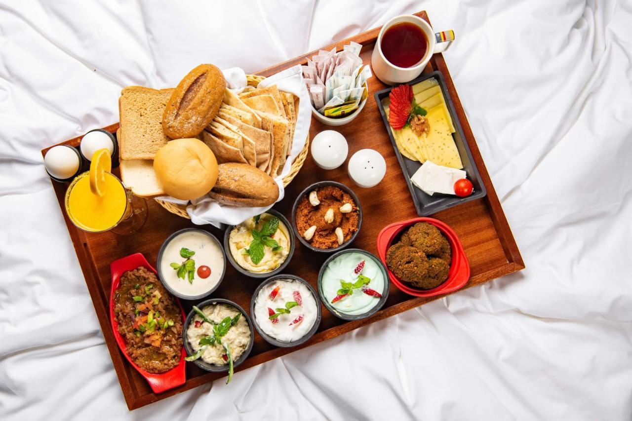 فندق بارك إن راديسون العزيزية مكة المظهر الخارجي الصورة A typical breakfast in India