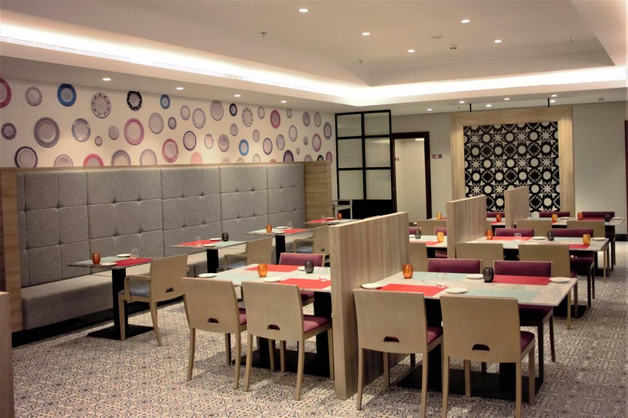 فندق بارك إن راديسون العزيزية مكة المظهر الخارجي الصورة The restaurant's interior